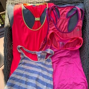 Batch of worn & unworn gym tank tops various sizes